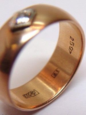 широкое золотое кольцо
