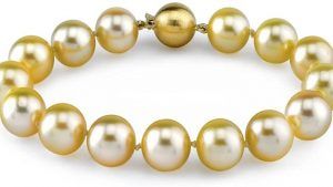 Желтый и золотистый жемчуг: как получается такой цвет камней и где их применяют