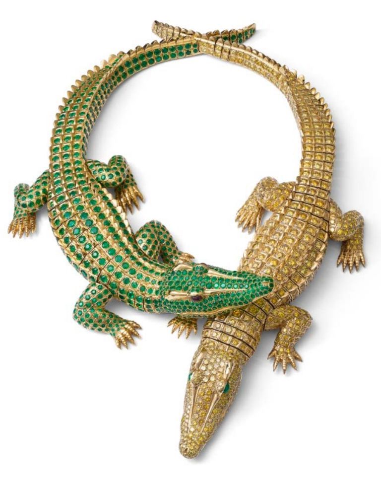 Золотое колье Марии Феликс от Cartier выполнено в виде двух крокодилов и украшено изумрудами и желтыми бриллиантами
