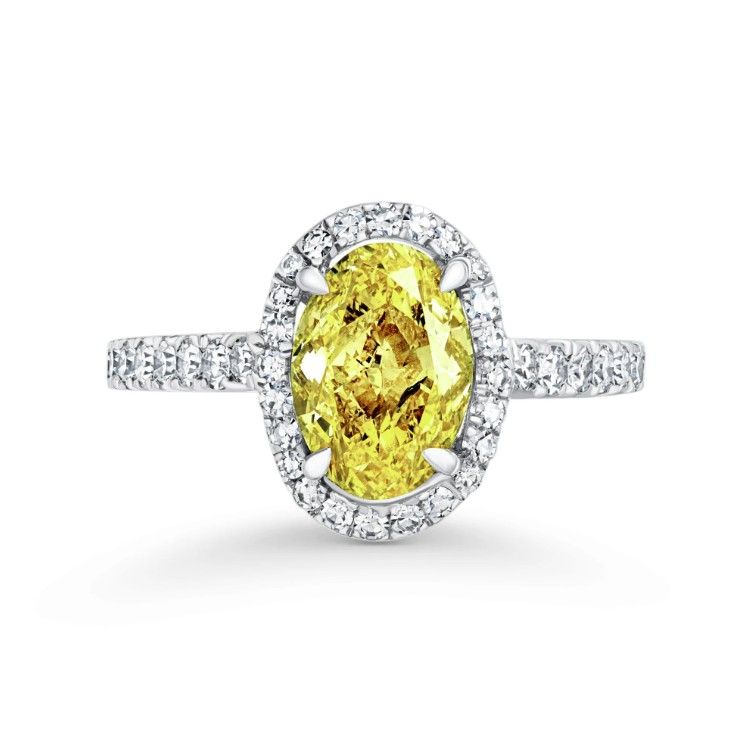 Кольцо от David Morris с фантазийным овальным бриллиантом ярко-желтого цвета