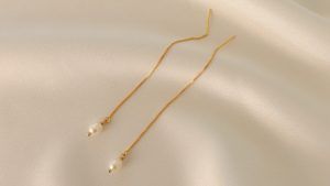 Серьги-протяжки с жемчугом: какие бывают, как выбрать и носить Серьги-протяжки с жемчугом: какие бывают, как выбрать и носить