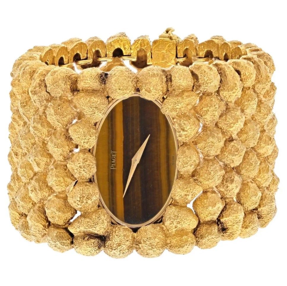 Часы Gold Nugget от Piaget из 18-каратного золота с циферблатом из тигрового глаза