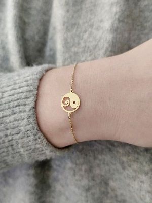 Символ Инь-Ян в ювелирных украшениях: значение, варианты аксессуаров