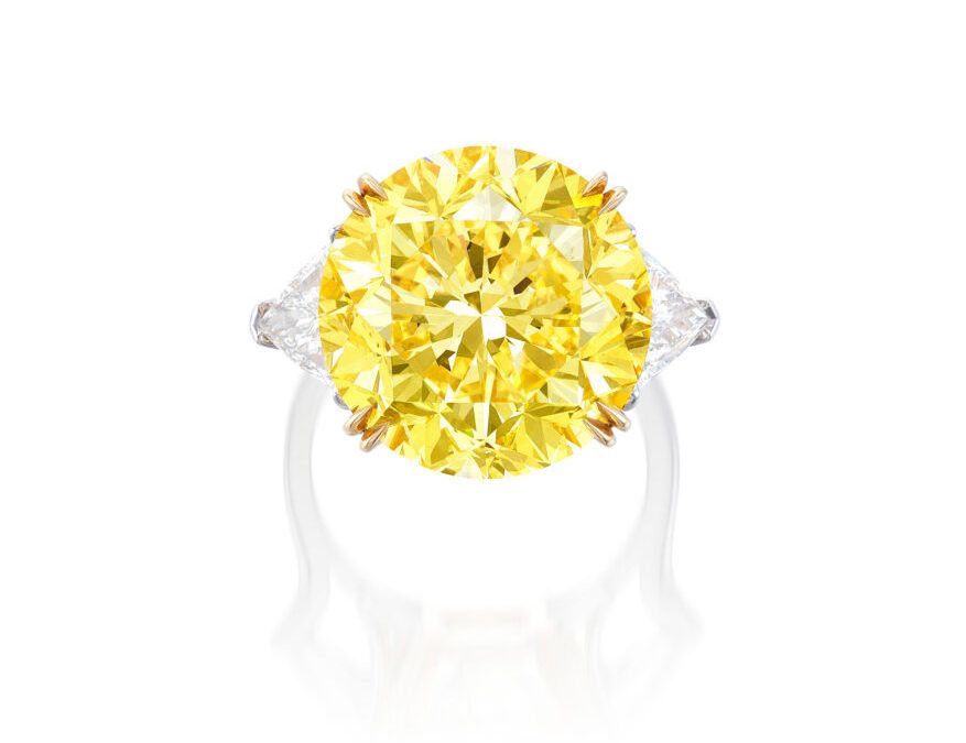 Кольцо с фантазийным ярко-желтым бриллиантом круглой огранки