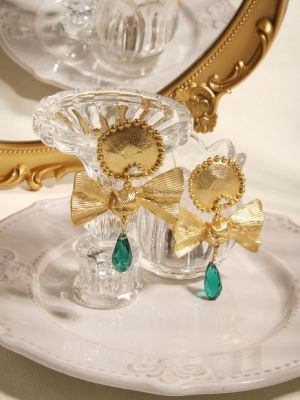 серьги с изумрудом