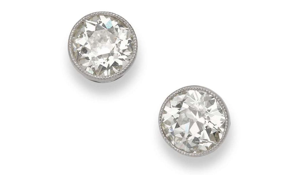 Серьги-гвоздики начала XX века с бриллиантами в оправе «милгрейн» Серьги-гвоздики начала XX века с бриллиантами в оправе «милгрейн»