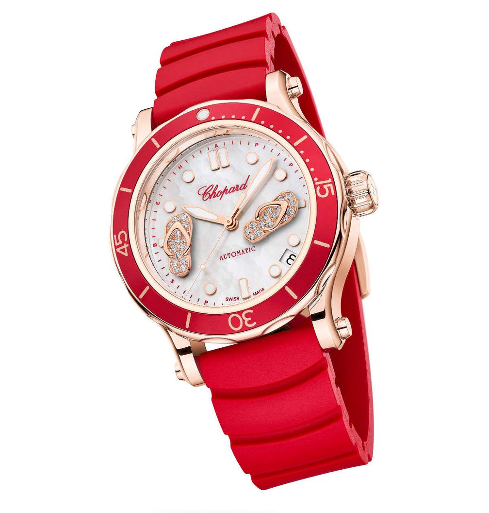 Версии Eden Rock модели Happy Ocean от Chopard поставляются либо с красным каучуковым ремешком, либо с полосатым волокнистым ремешком (на фото вверху) 