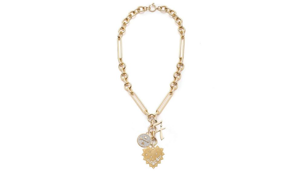 Это ожерелье украшено средним медальоном Dream и инкрустированным бриллиантами крупным медальоном Heart