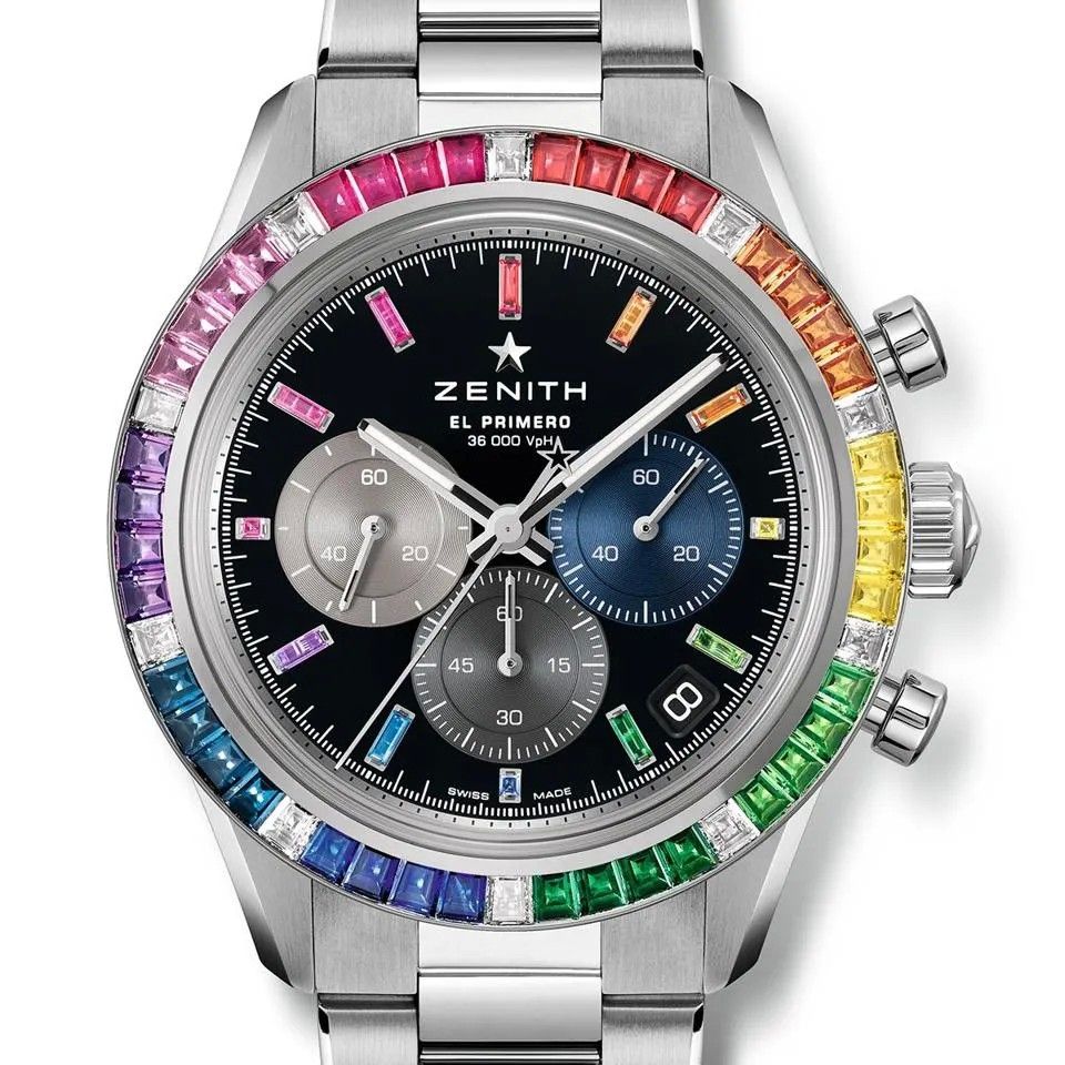 Часы Chronomaster Sport Rainbow от Zenith с секциями разноцветных сапфиров на безеле, которые разделены бриллиантами Часы Chronomaster Sport Rainbow от Zenith с секциями разноцветных сапфиров на безеле, которые разделены бриллиантами