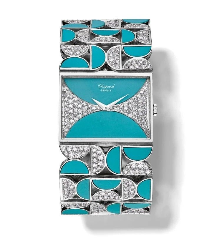 Женские наручные часы 1973 года: белое золото, циферблат с 66 бриллиантами и бирюзой, шарнирный браслет с 432 бриллиантами и бирюзой Женские наручные часы 1973 года: белое золото, циферблат с 66 бриллиантами и бирюзой, шарнирный браслет с 432 бриллиантами и бирюзой