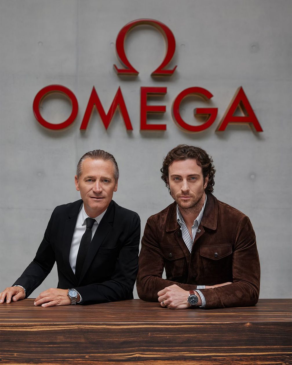 Аарон Тейлор-Джонсон с президентом и генеральным директором Omega Рейнальдом Эшлиманном
