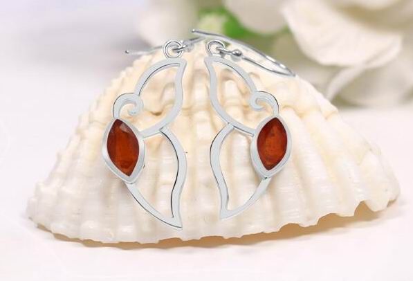 Украшения с оранжевым кианитом