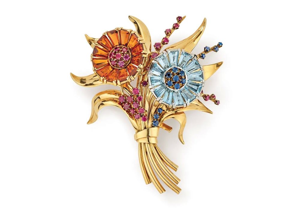 Зажим Bouquet из желтого золота, рубинов, сапфиров, аквамаринов и топазов, 1938 г. Коллекция Van Cleef & Arpels Heritage 