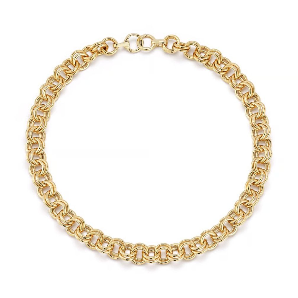 Это ожерелье от Jade Trau изготовлено из желтого золота