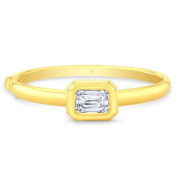 Браслет-бэнгл Bezel из 18-каратного желтого золота с бриллиантом изумрудной огранки Браслет-бэнгл Bezel из 18-каратного желтого золота с бриллиантом изумрудной огранки