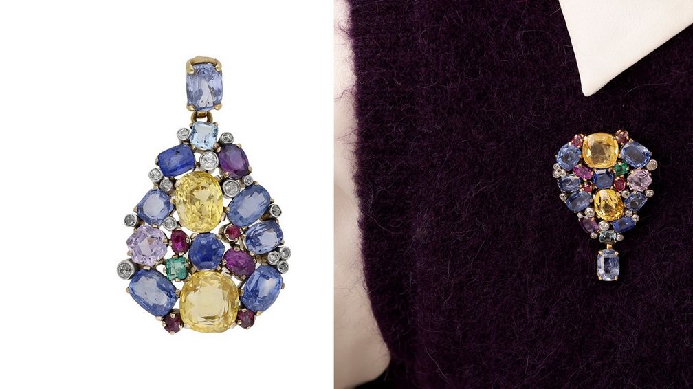 Этот кулон с бриллиантами и драгоценными камнями можно перевернуть и носить как брошь Этот кулон с бриллиантами и драгоценными камнями можно перевернуть и носить как брошь