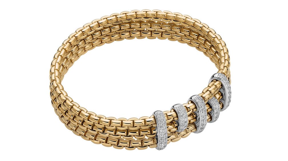 Браслет Maori («Маори») из коллекции Eka из 18-каратного желтого золота с бриллиантами в оправе из 18-каратного белого золота 