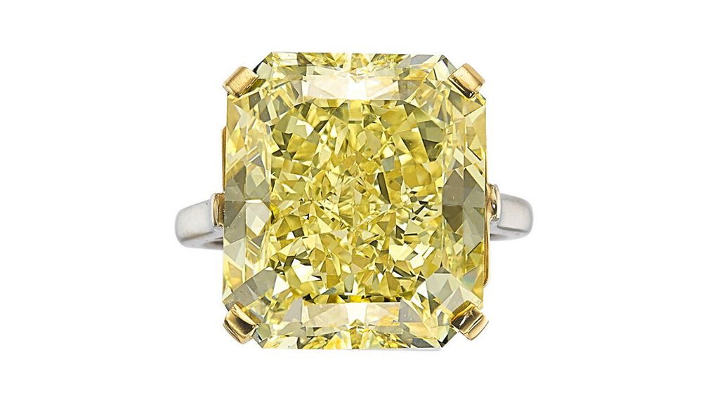 Кольцо от Cartier с бриллиантом фантазийного насыщенно-желтого цвета весом 20,03 карата