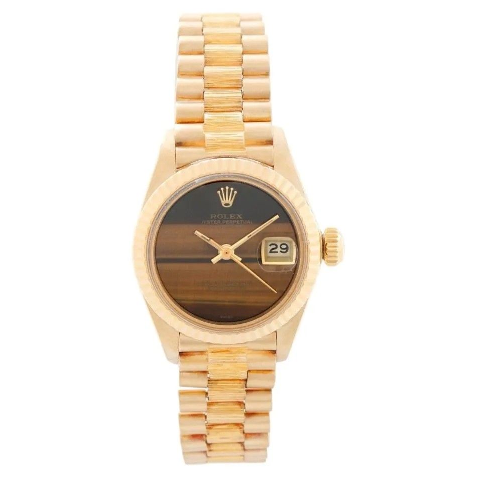 Часы Rolex President (модель 6927) с циферблатом из тигрового глаза, 1979 г. Часы Rolex President (модель 6927) с циферблатом из тигрового глаза, 1979 г.